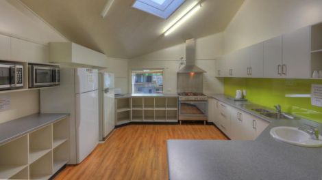 The fully equipped modern camp kitchen at Myrtleford Holiday Park